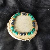 Bracelet en bois pétrifié, malachite et hématite non magnétique.